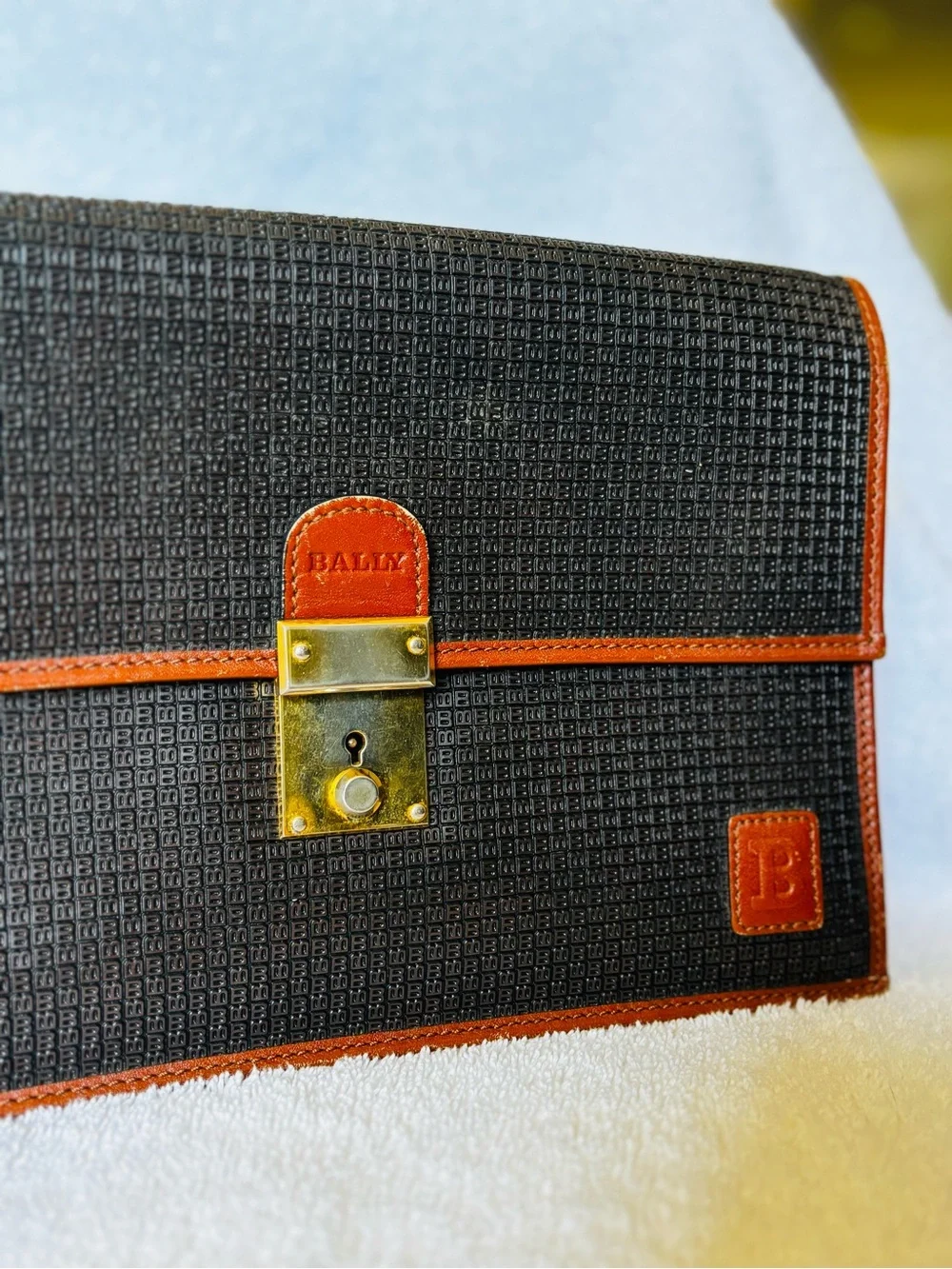 Bally Black Leather Wristlet with Brown Leather Trim and Brass Lock Accent - Picture 2 of 9